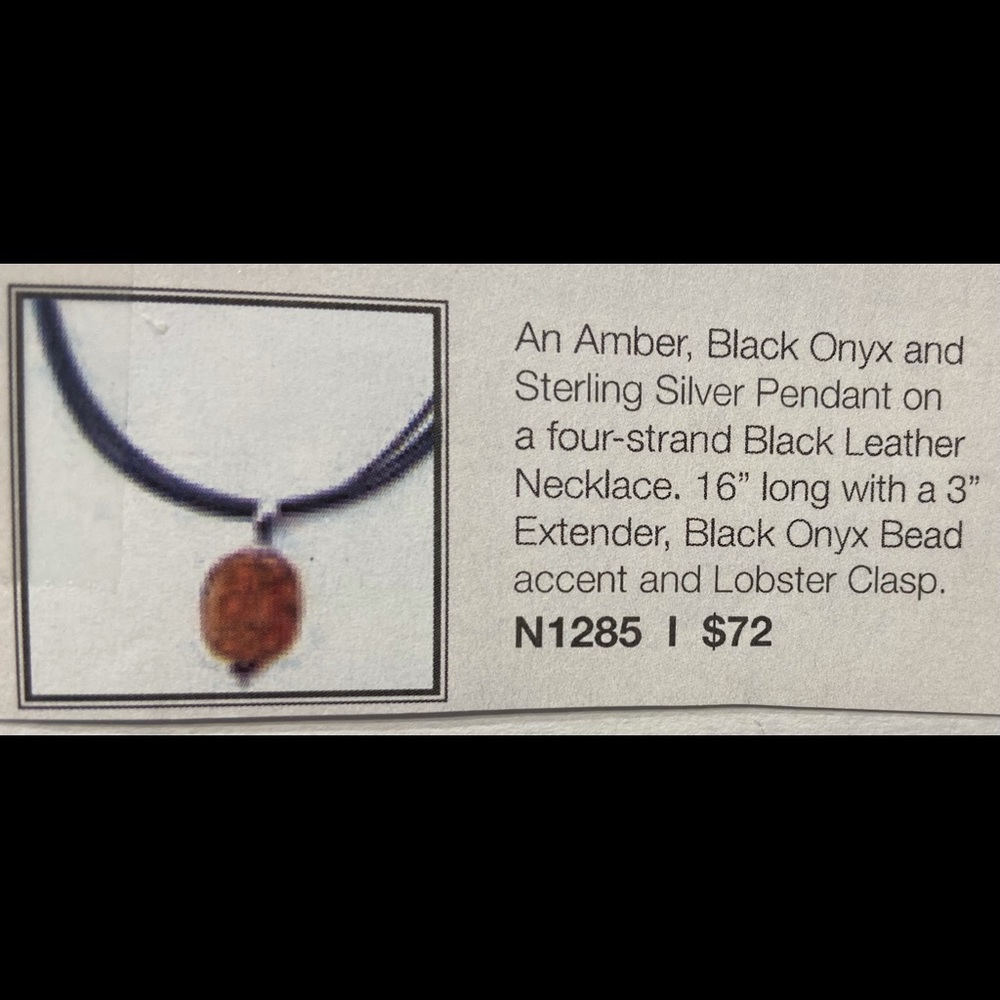 Amber and black onyx pendant on 16” leather